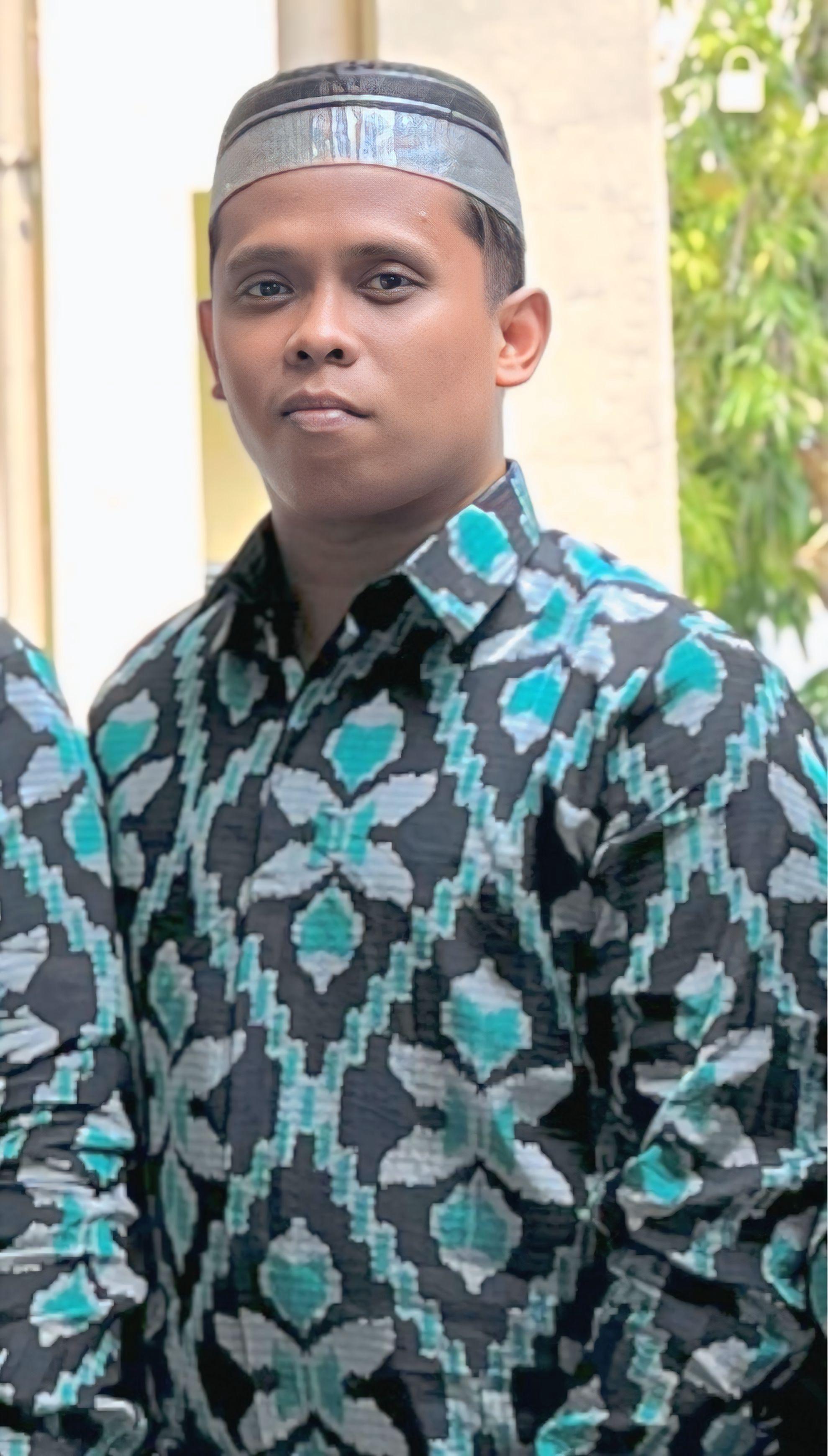 TAUFIQ AKBAR,S.Sos